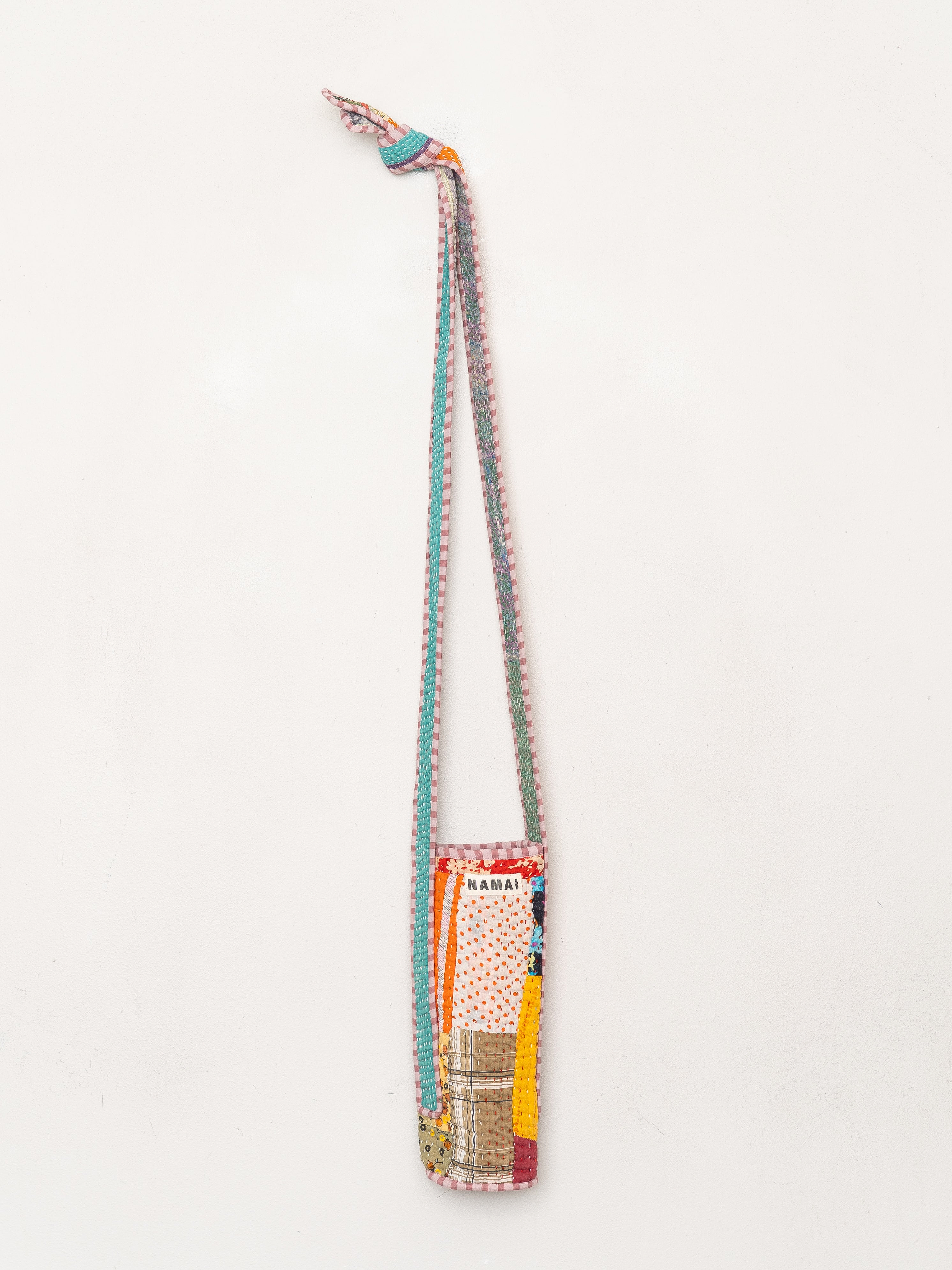The Lota Quilted Water Bottle Crossbody + NAMAI Water Bottle