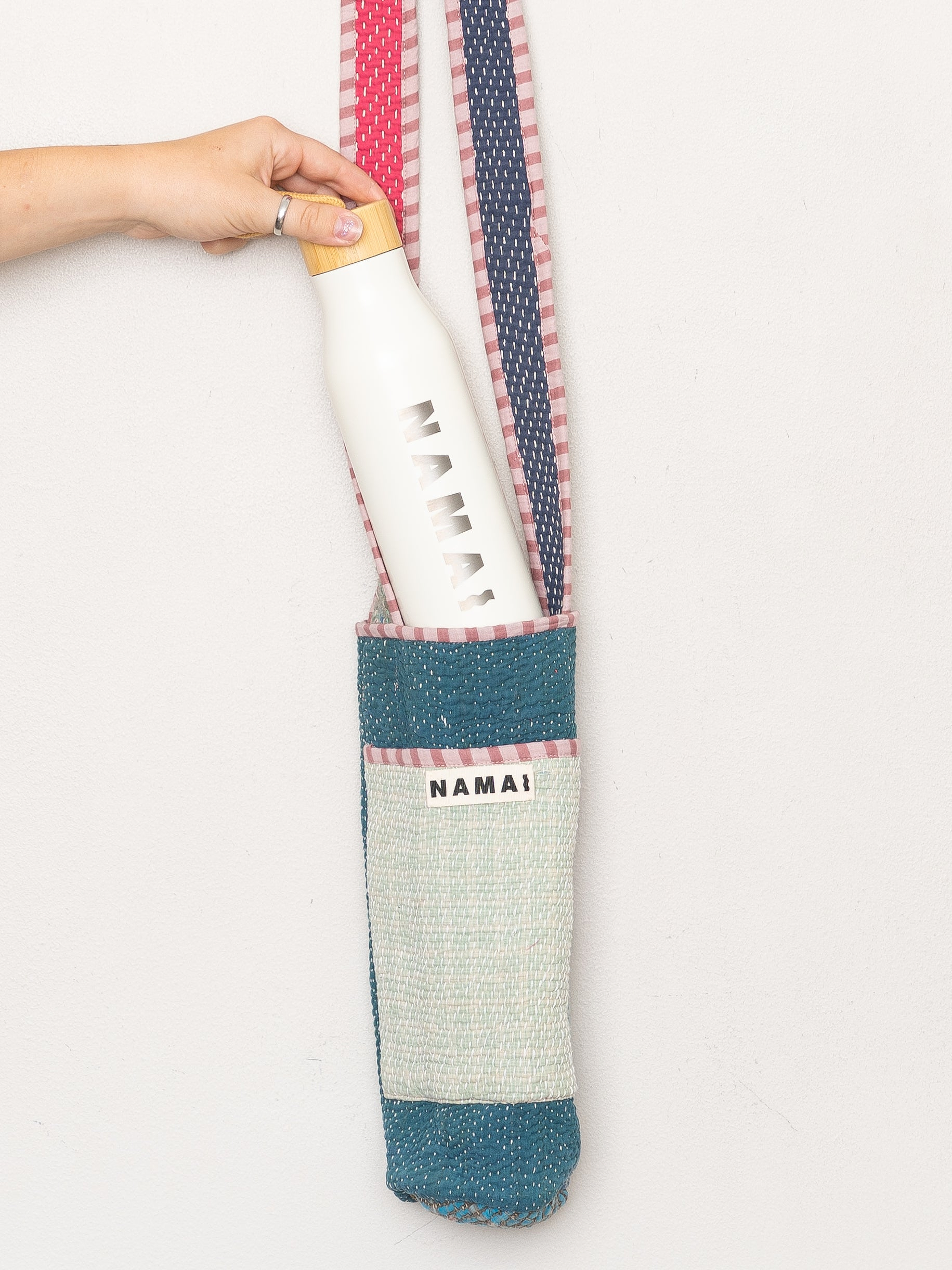 The Lota Quilted Water Bottle Crossbody + NAMAI Water Bottle