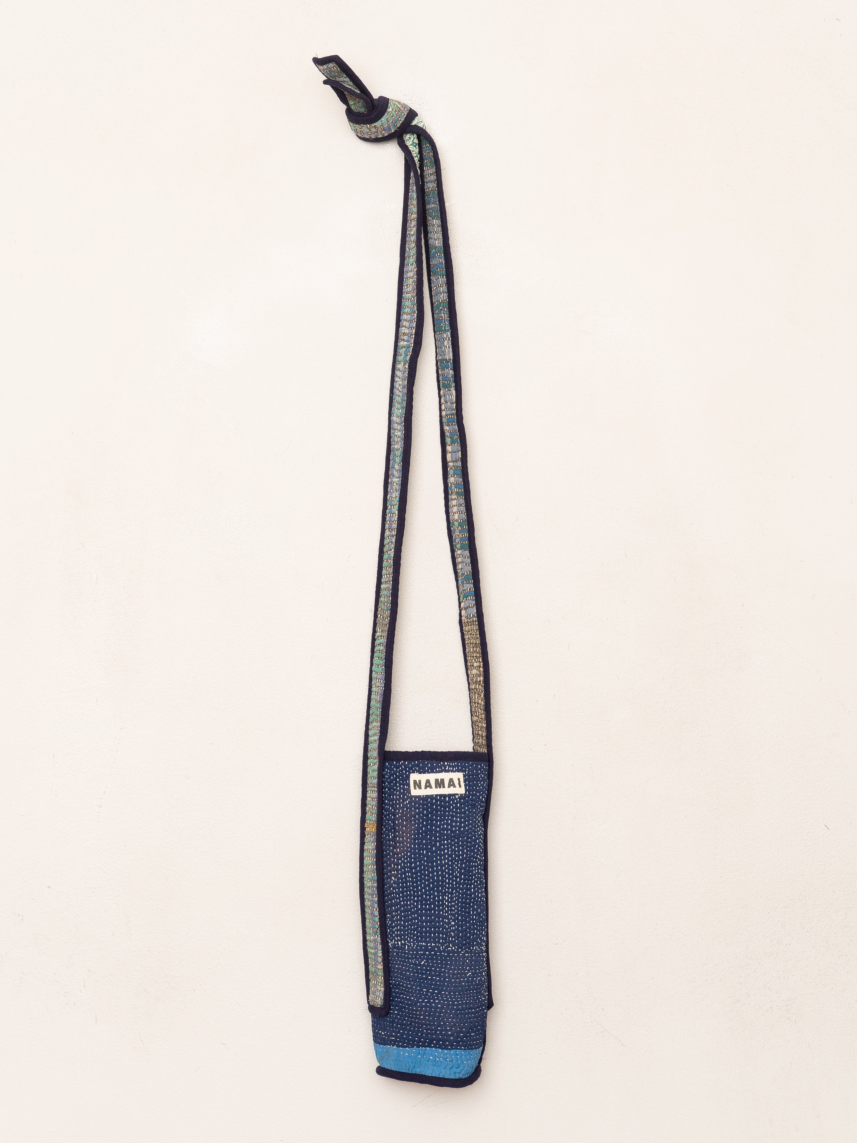 The Lota Quilted Water Bottle Crossbody + NAMAI Water Bottle