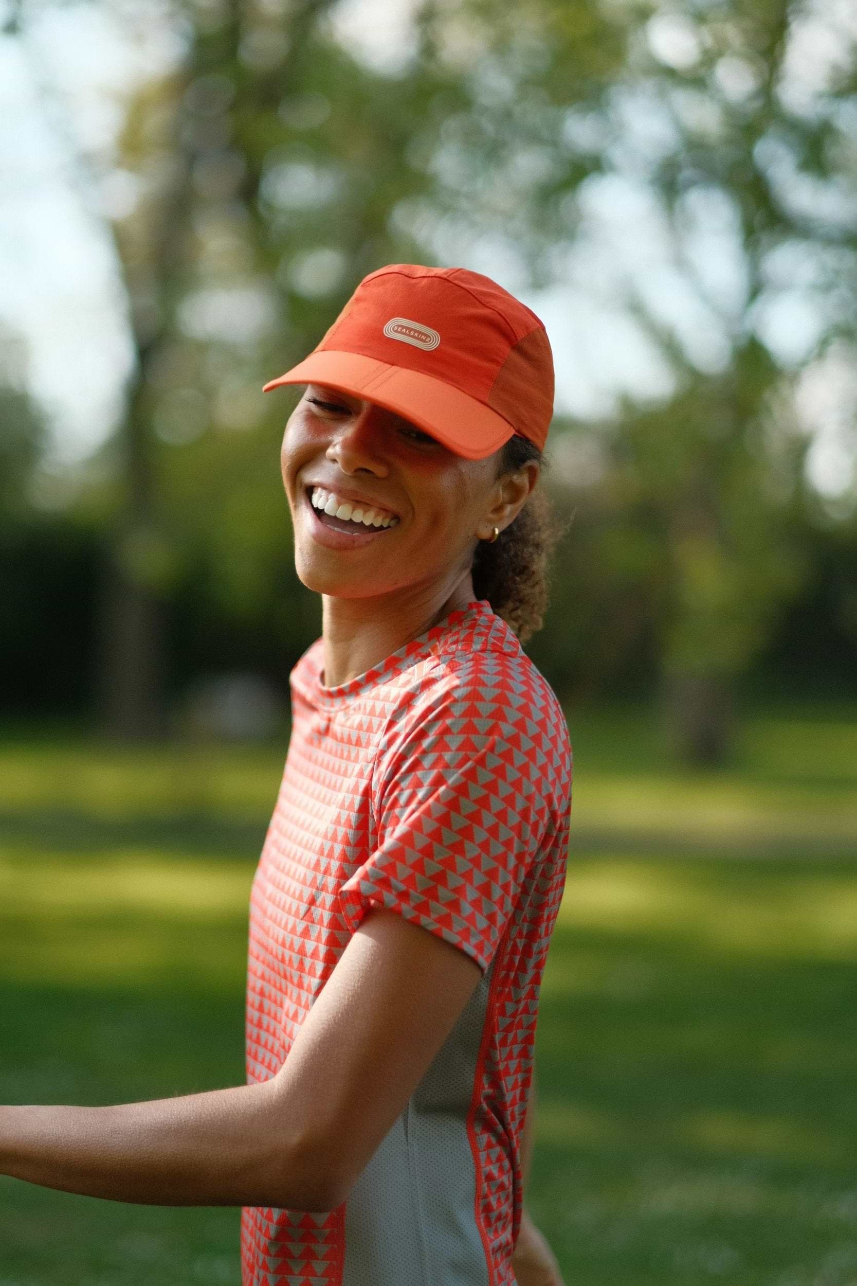 Woman wears lightweight running cap