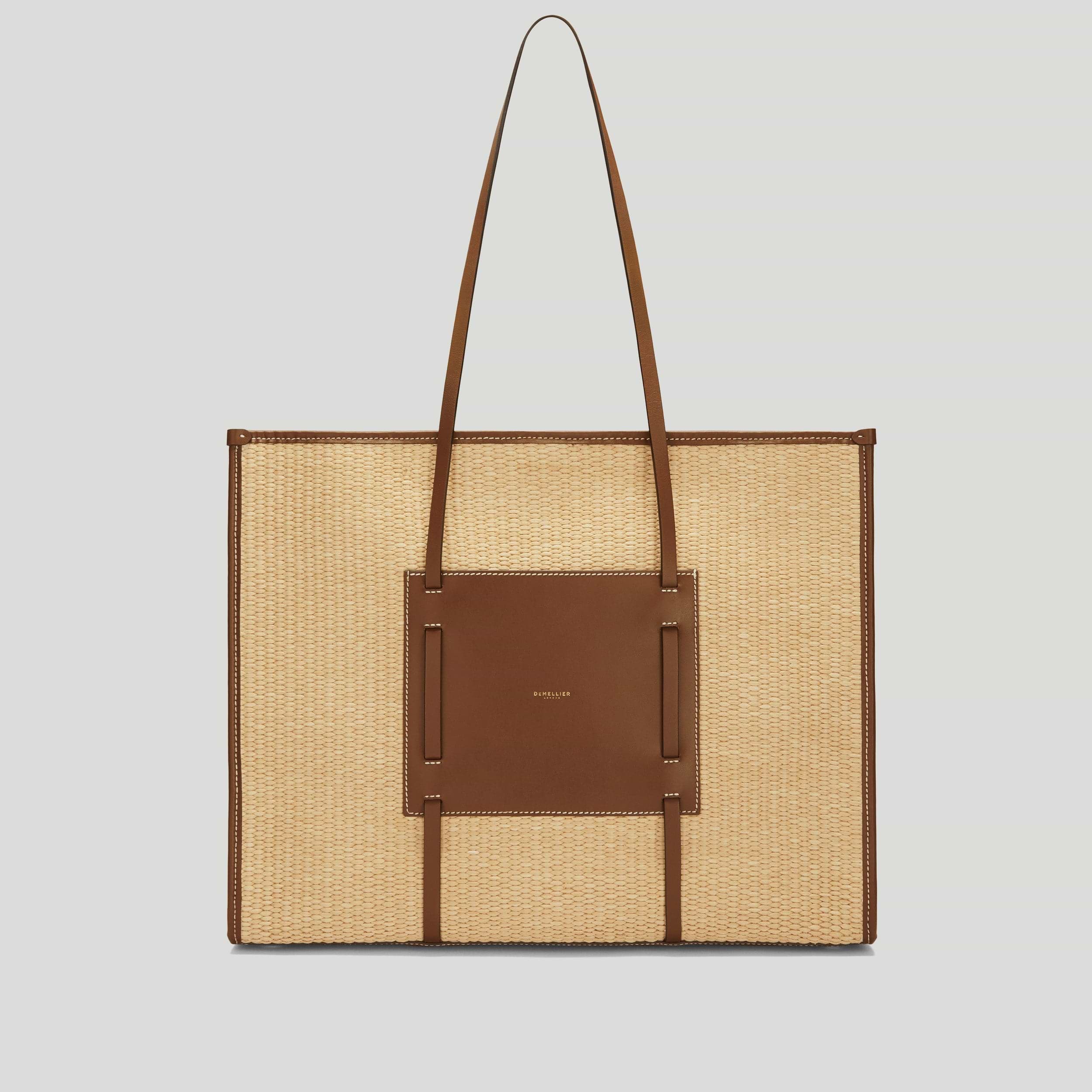 DeMellier Large Capri raffia tote front view in warm raffia with tan smooth leather trim