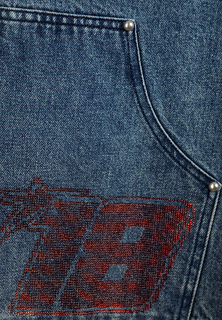 Close-up of Ashluxe Patch Denim Short showing the 18 ash design.