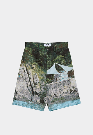 MSGM forest green Bermuda shorts in technical gabardine with pockets, luxury lifestyle brand.