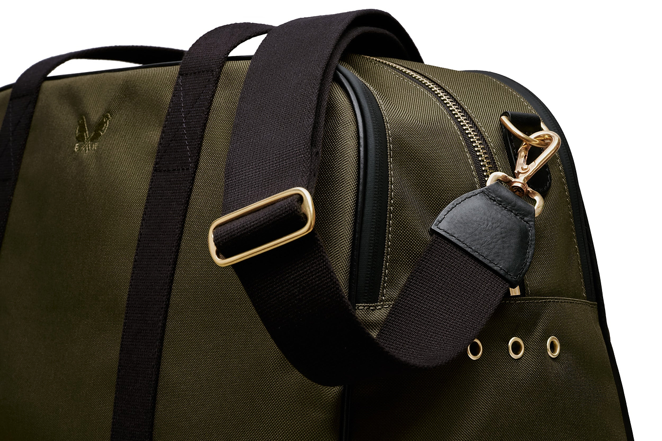 side view of the green sports holdall with the crossbody strap