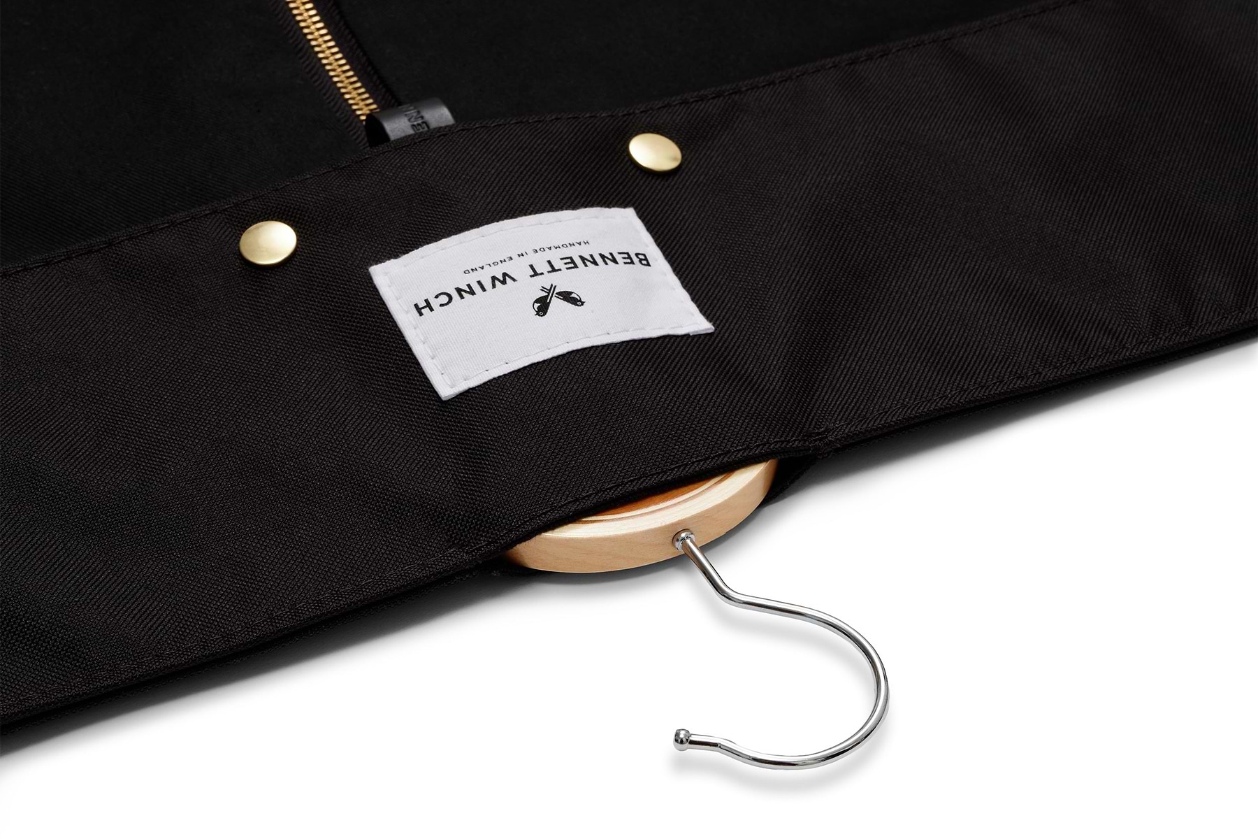 the hanger compartment of the black trifold