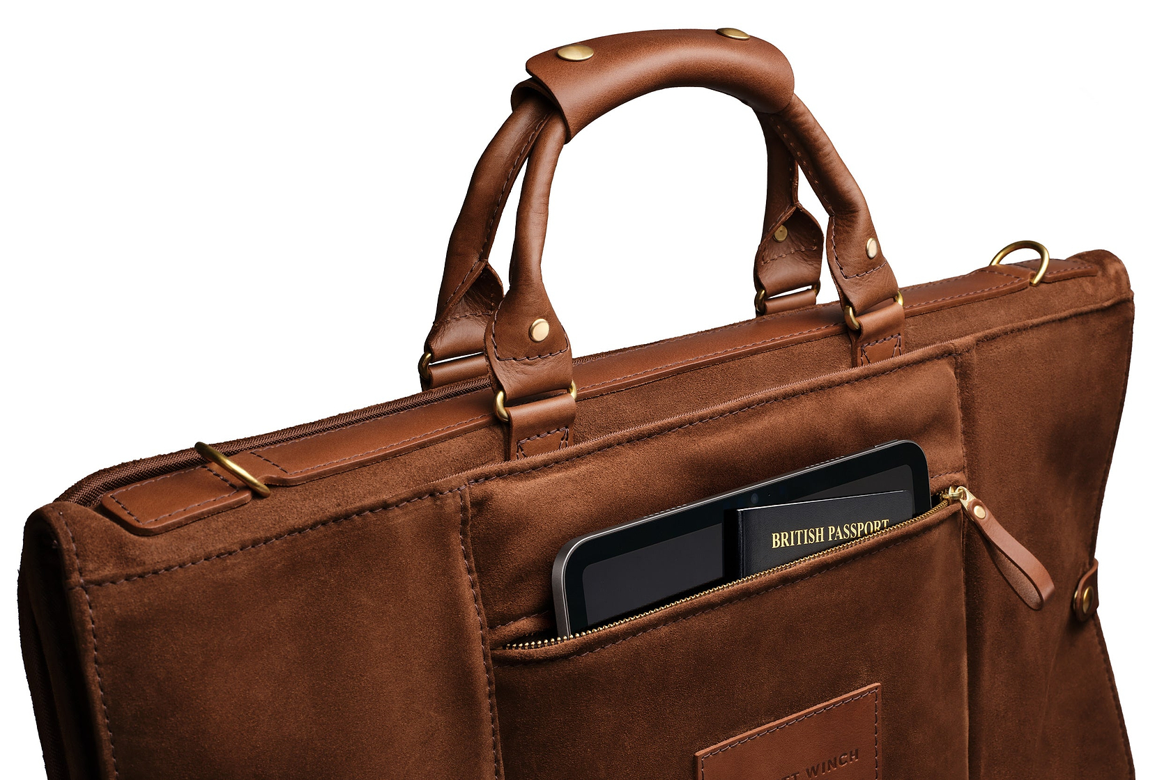 view of back storage pocket on the brown suede trifold