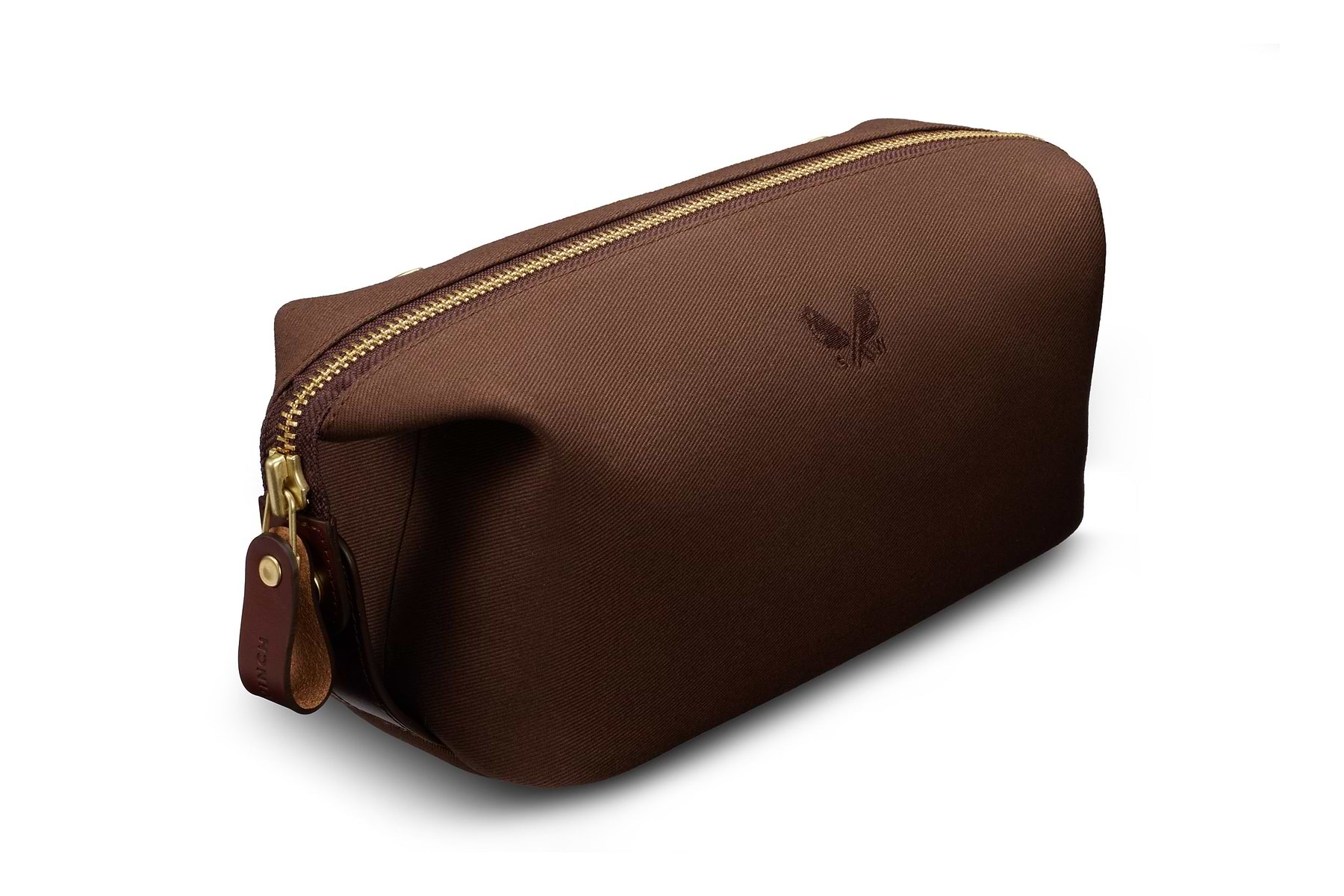 side view of brown dopp kit