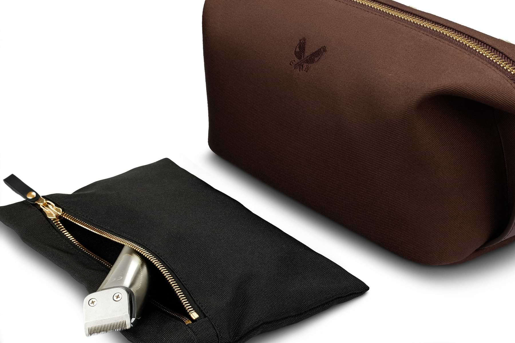 interior clip out wet compartment of brown canvas toiletry bag