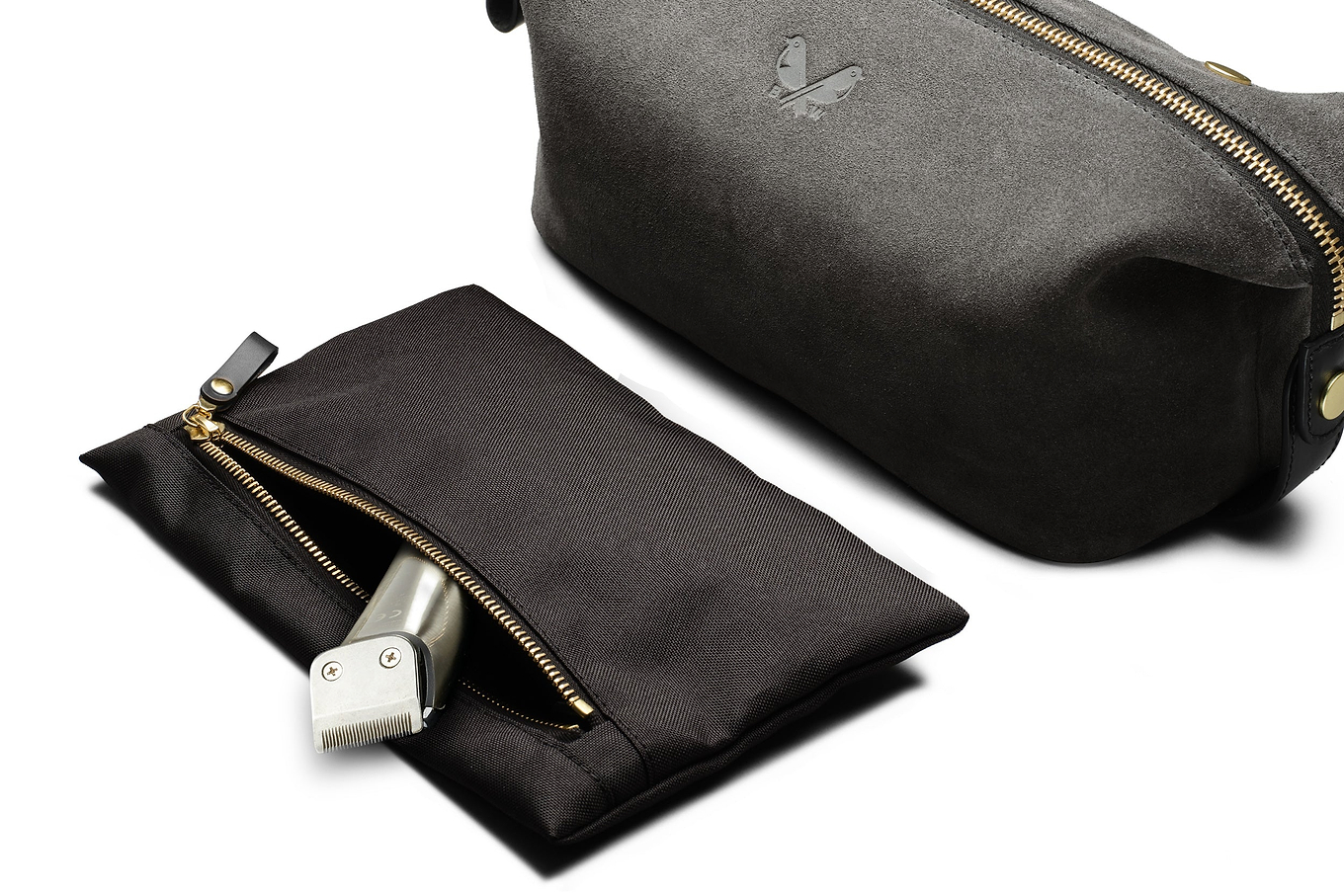 interior clip out wet compartment of grey suede dopp kit