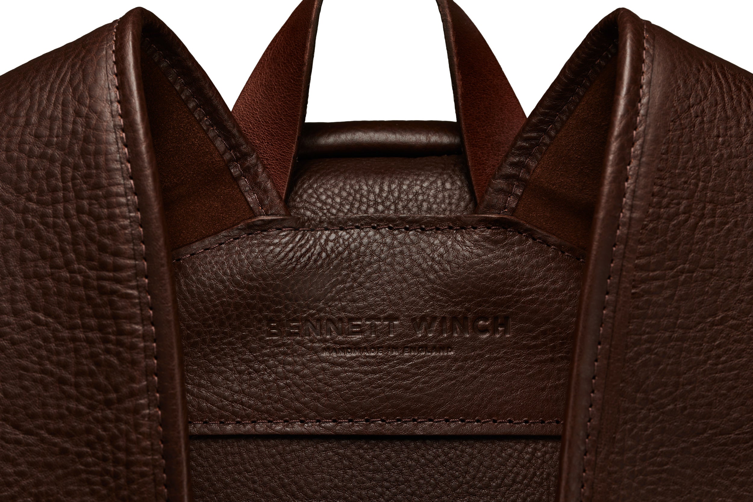 the Bennett Winch branding on the leather on the backside of backpack 