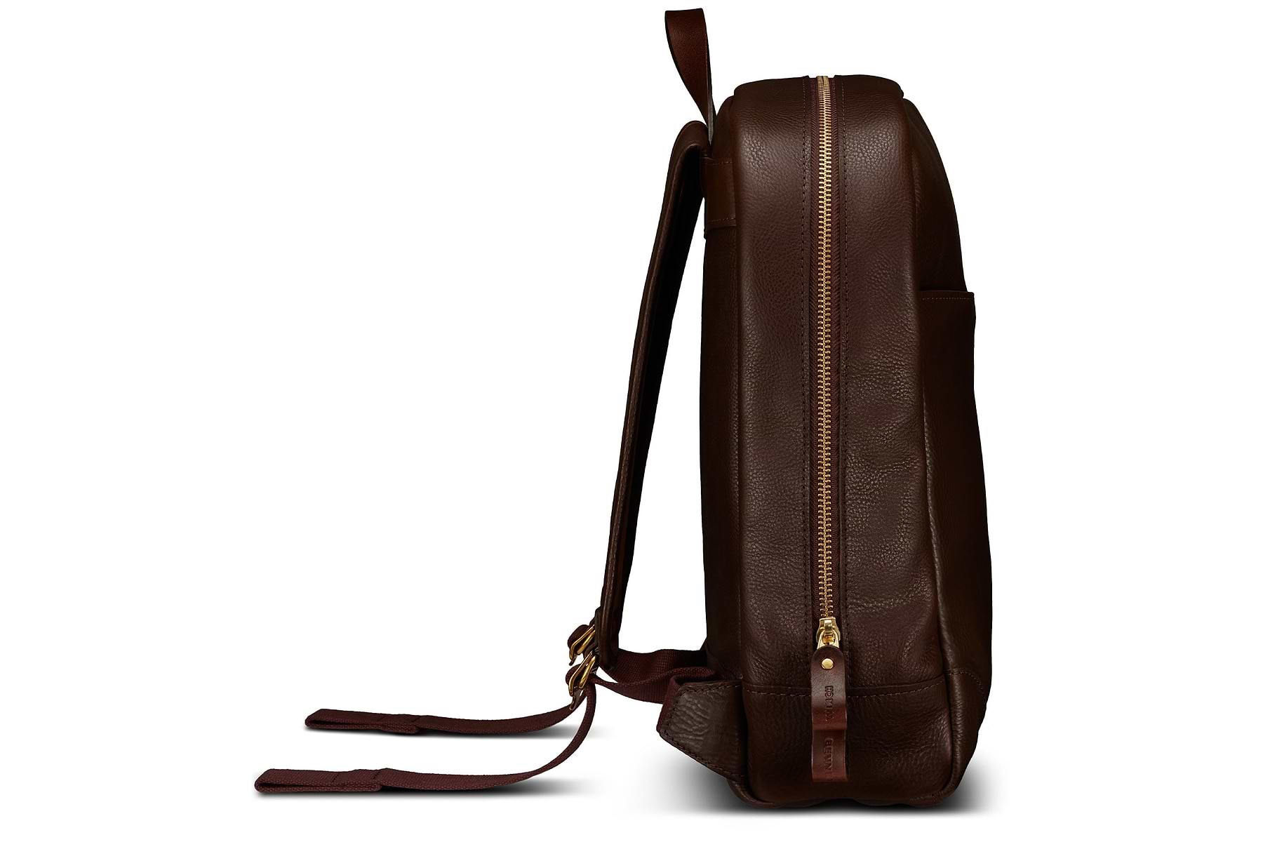 side view of sleek brown leather backpack