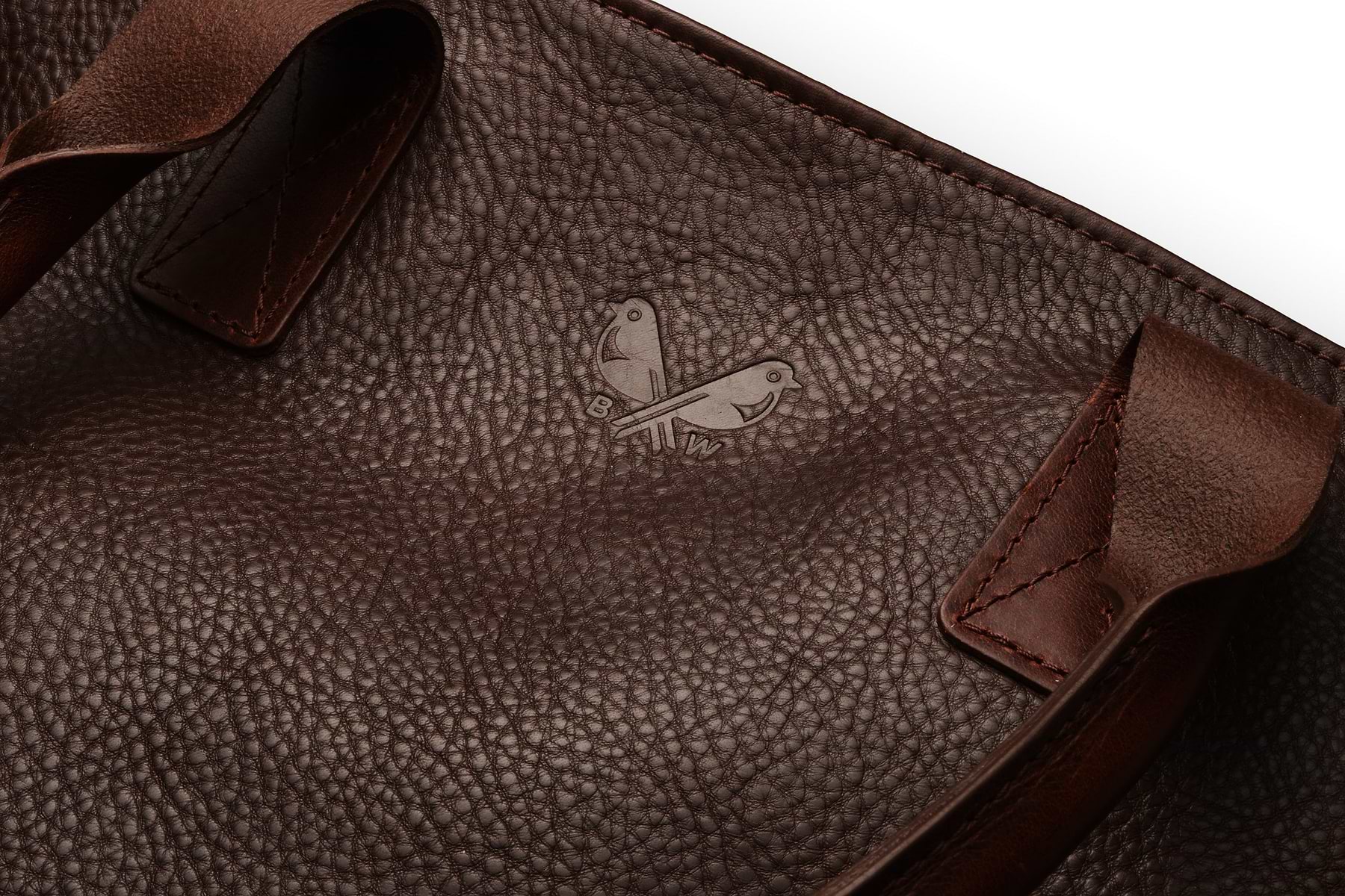 the Bennett Winch logo pressed into the leather tote