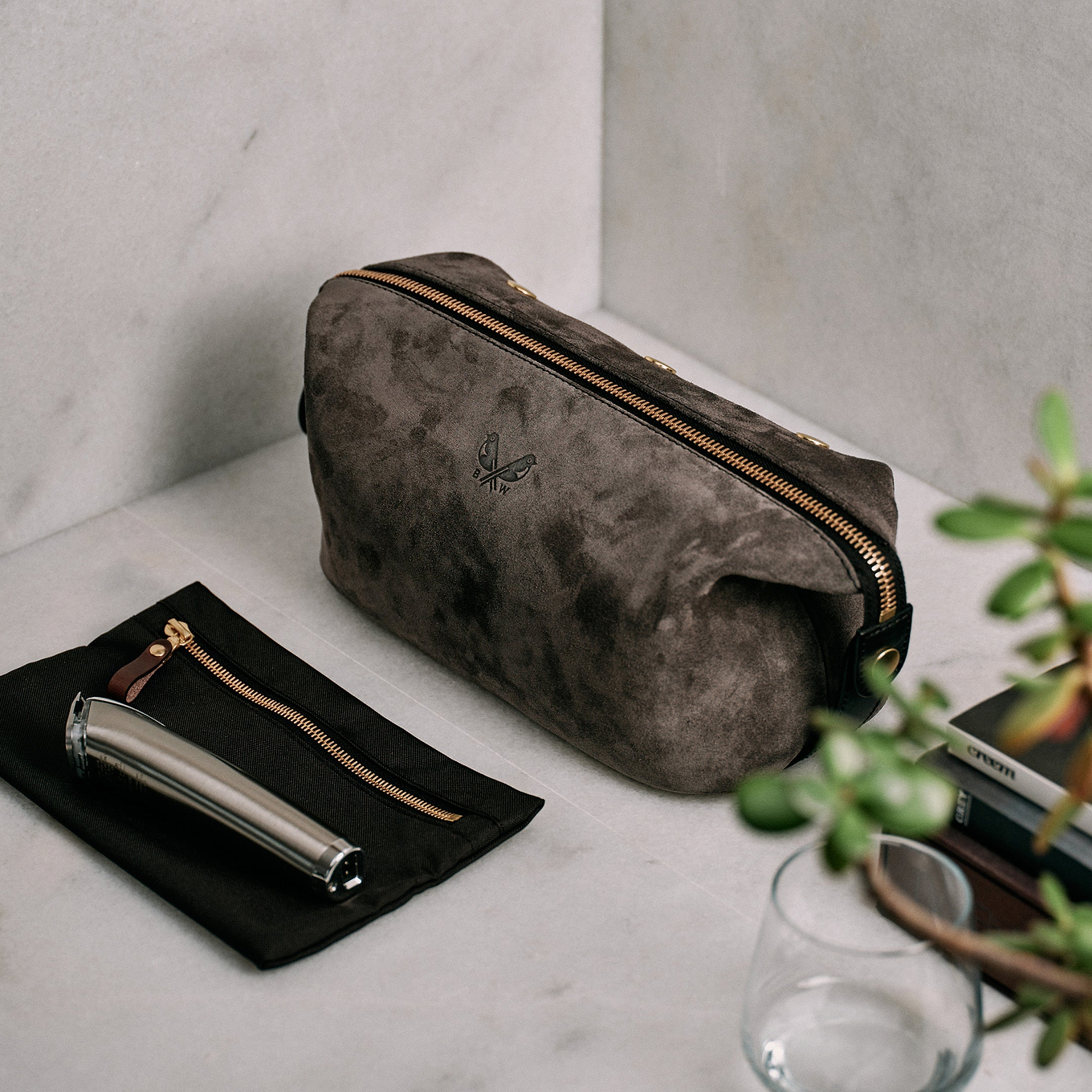 grey suede toiletry bag with removable wet compartment