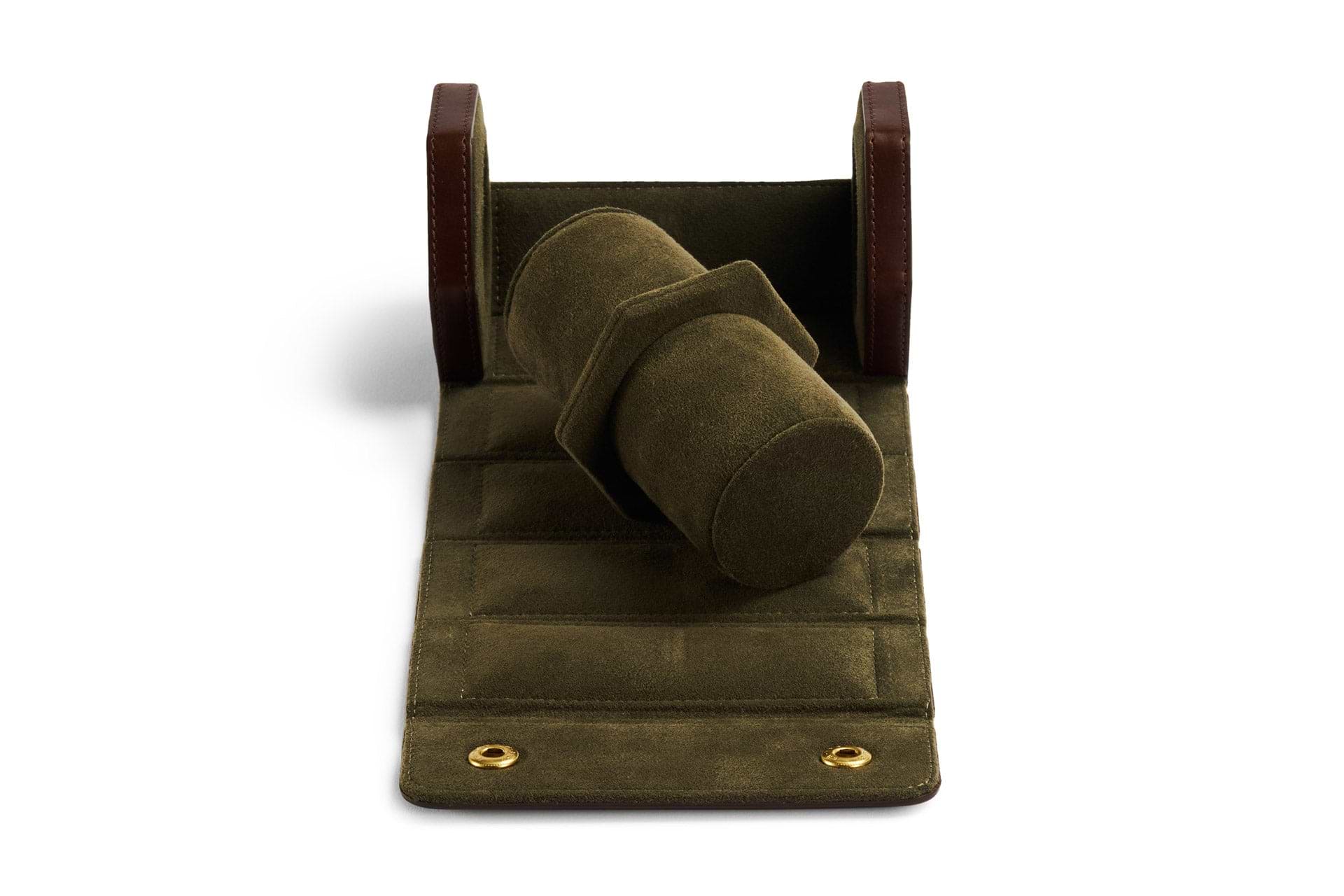 The interior of the brown leather two section watch roll 