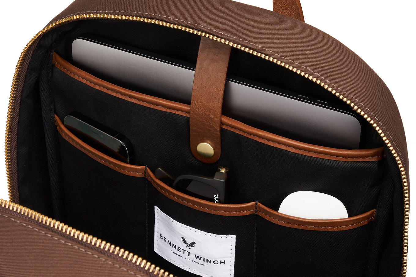 the organizers compartments in sleek brown backpack