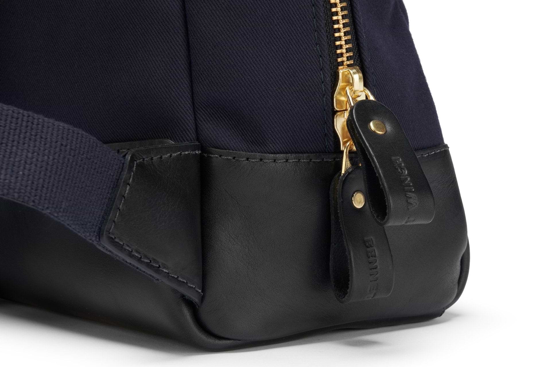 zip closure on luxury navy backpack
