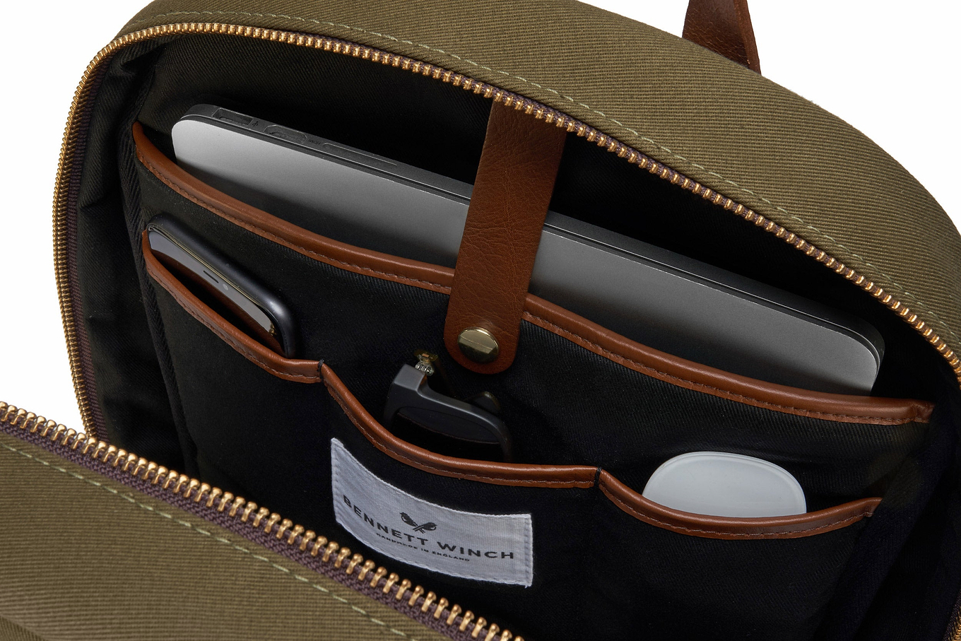 Close up onforganizing compartments in luxury backpack
