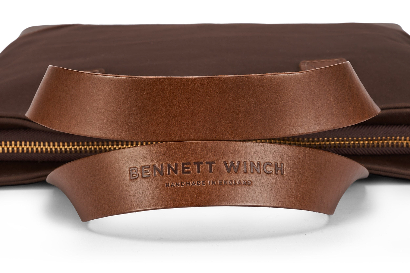 Bennett Winch name pressed onto the leather handle of tote