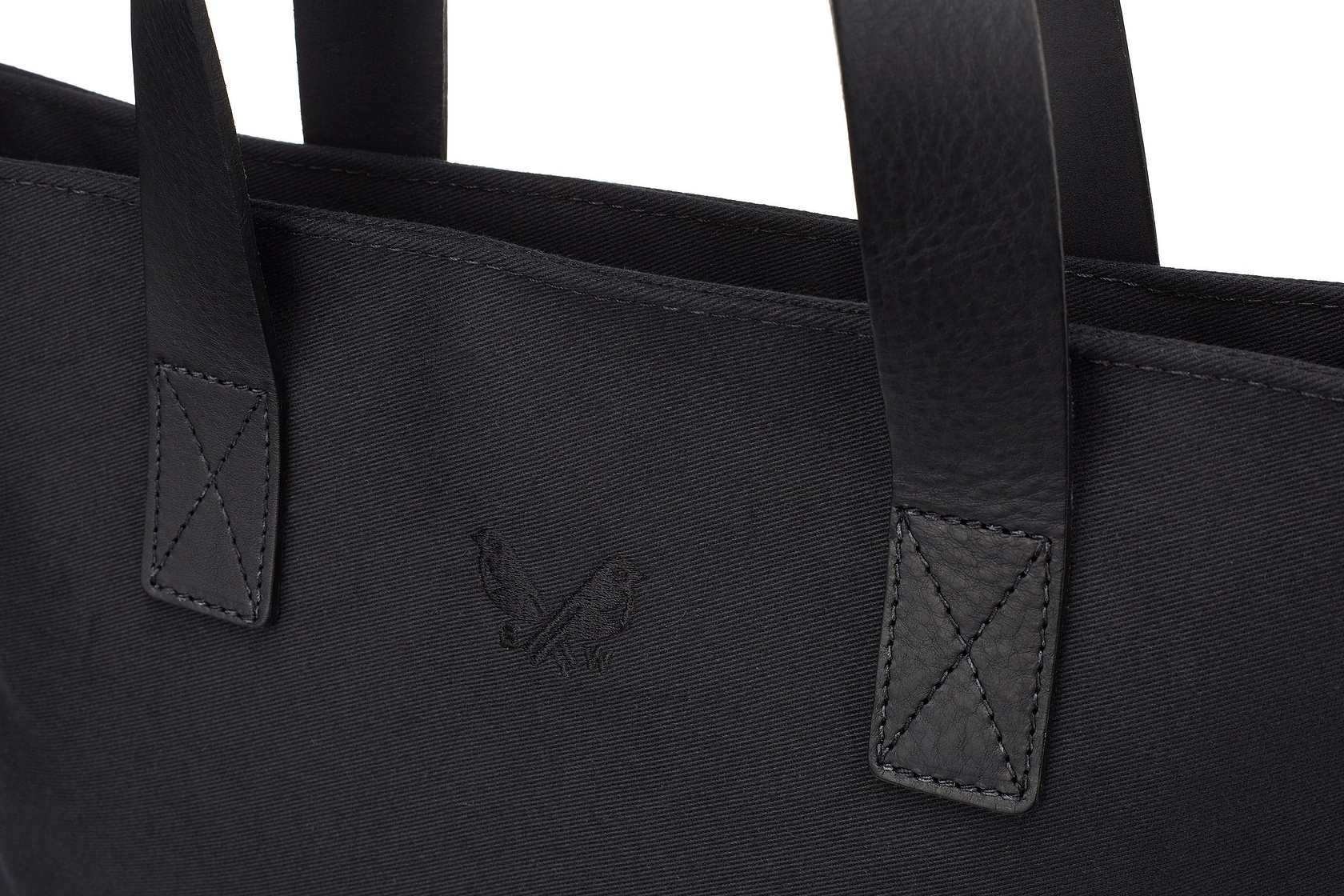 the Bennett Winch logo pressed into the canvas tote