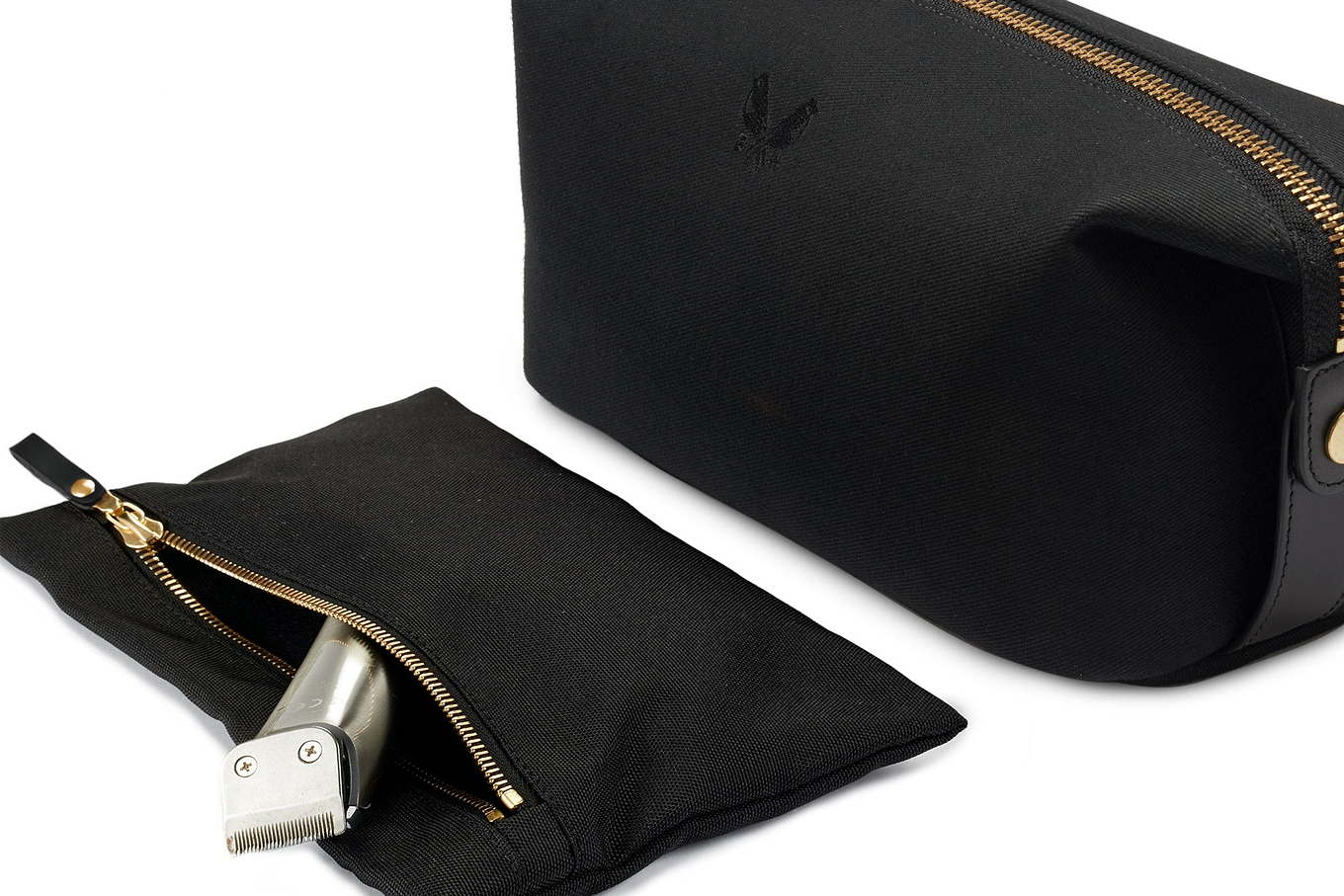 the removable wet compartment of the black canvas bennett winch wash bag