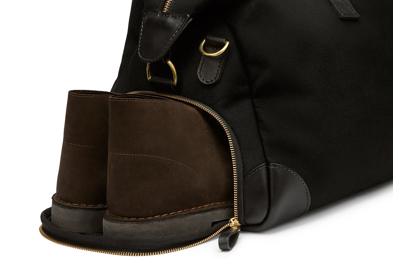 close up of the separate shoe compartment on the weekend bag