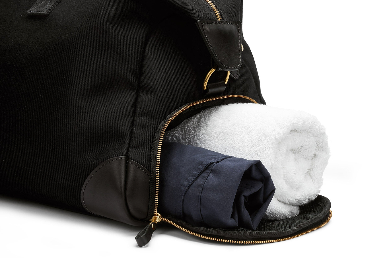 close up of the separate shoe compartment on the weekend bag