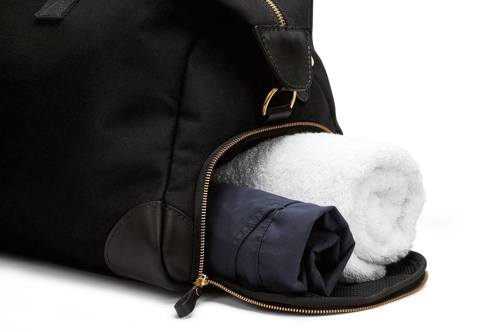 close up of the separate shoe compartment on the weekend bag