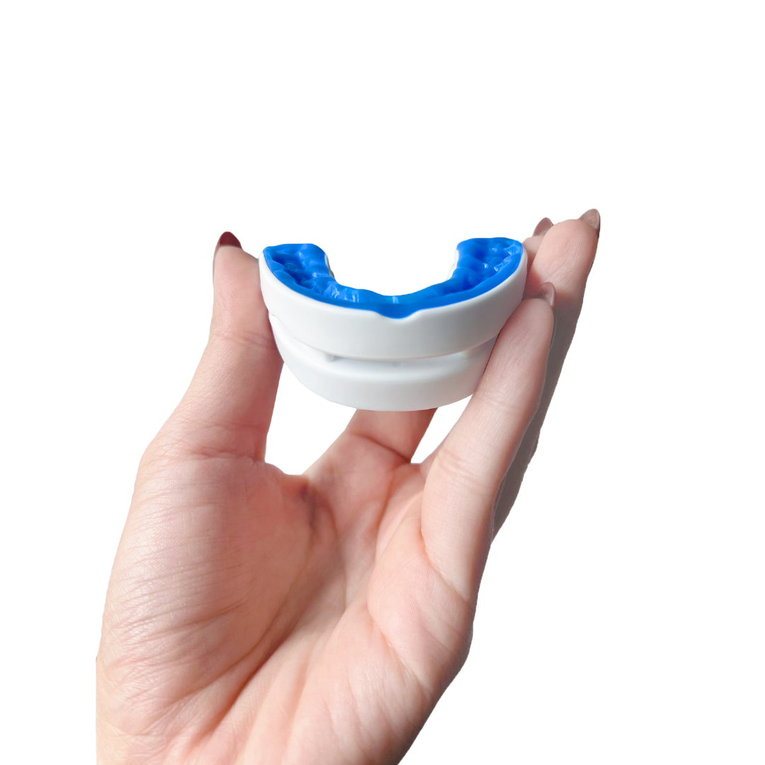 VitalSleep anti-snoring mouthpiece in hand