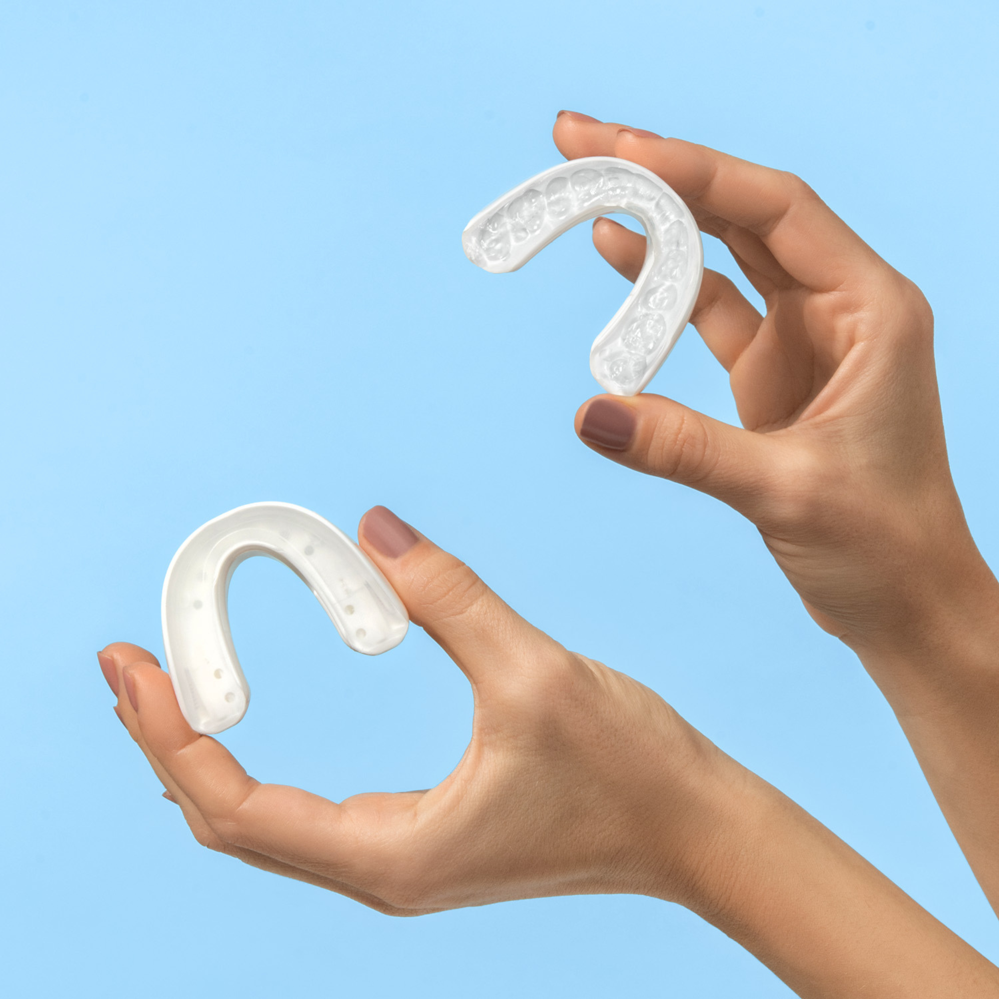 snoring mouthpiece held in hands