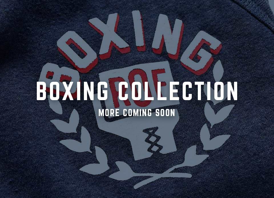 'Boxing Collection announcement on dark fabric background.'