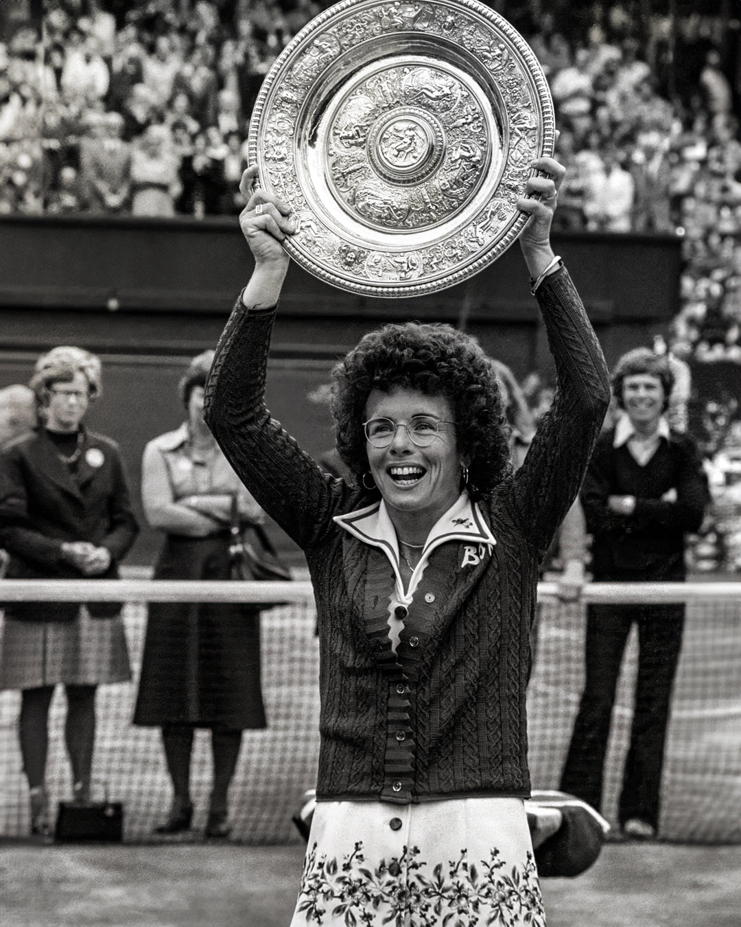 Billie Jean King holds the winner’s plate after winning her sixth Wimbledon Ladies’ Singles title on July 4, 1975, defeating Evonne Goolagong Cawley 6-0, 6-1.