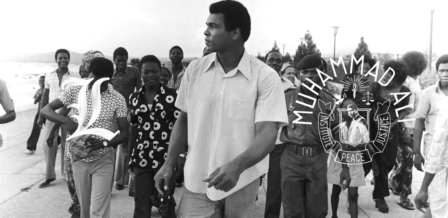 A man walks outdoors surrounded by a group of people, with 'Muhammad Ali' text overlay.