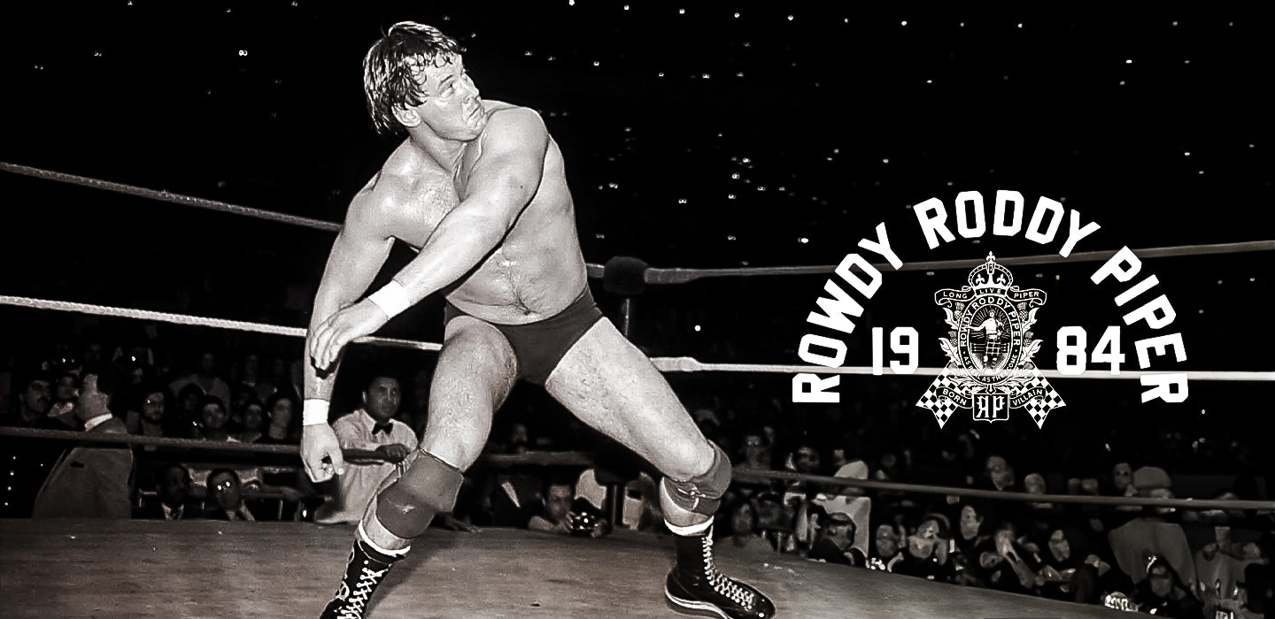 Black and white photo of a wrestler in action, labeled 'Rowdy Roddy Piper 1984.'
