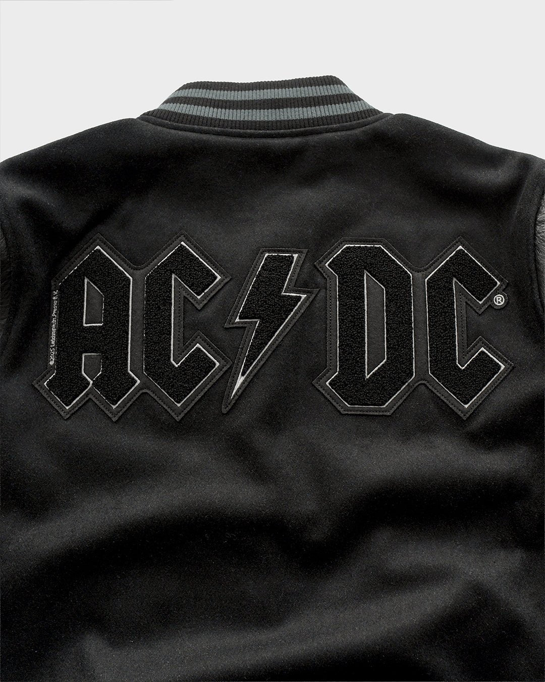 AC/DC Through The Eras Black Varsity Jacket - Roots of Fight Canada