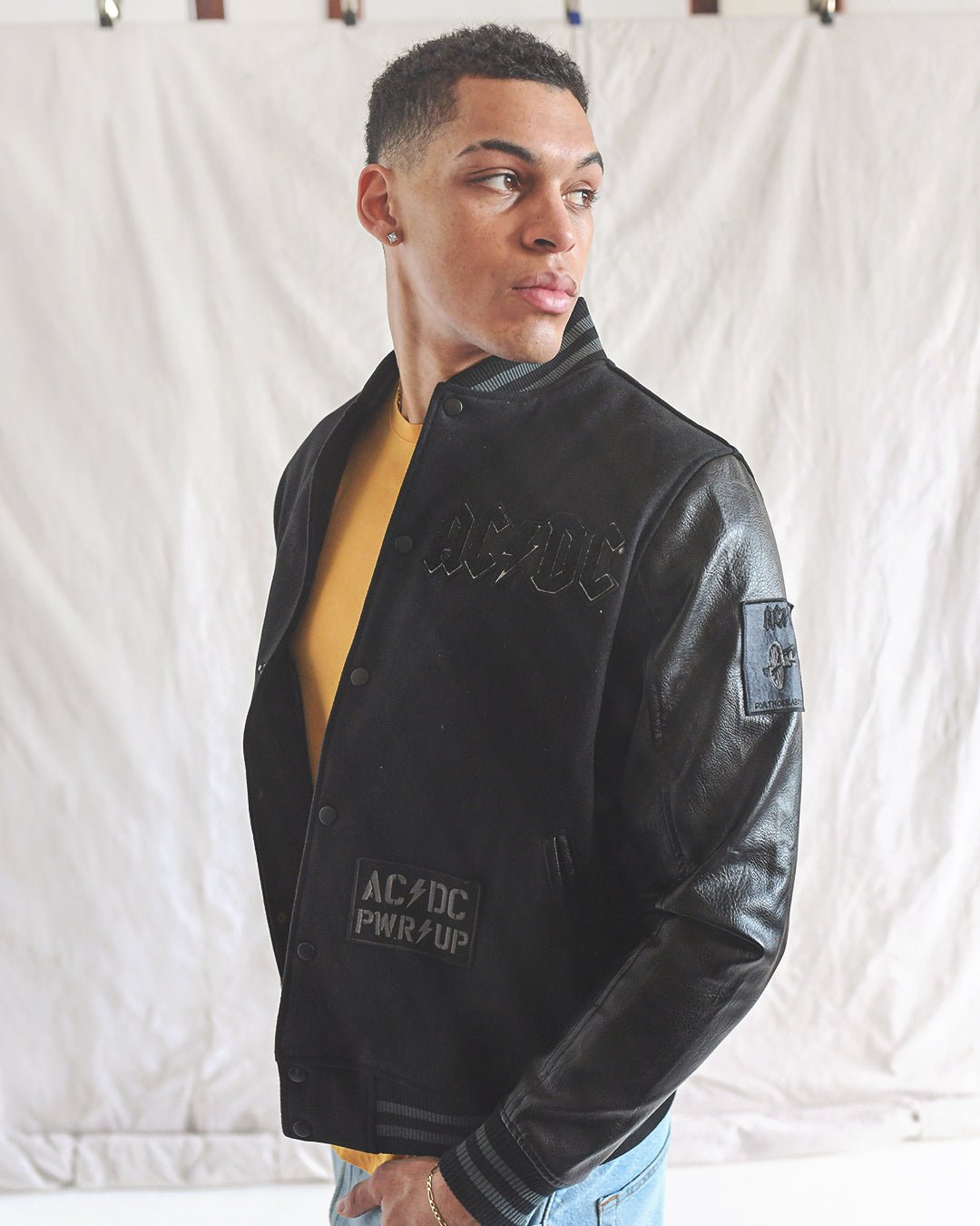 AC/DC Through The Eras Black Varsity Jacket - Roots of Fight