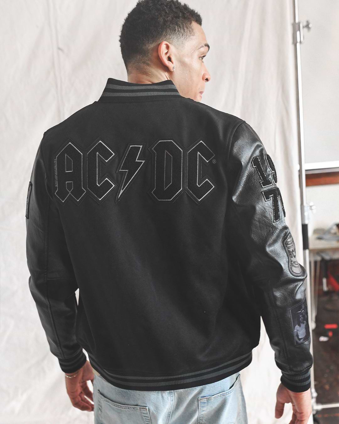AC/DC Through The Eras Black Varsity Jacket - Roots of Fight