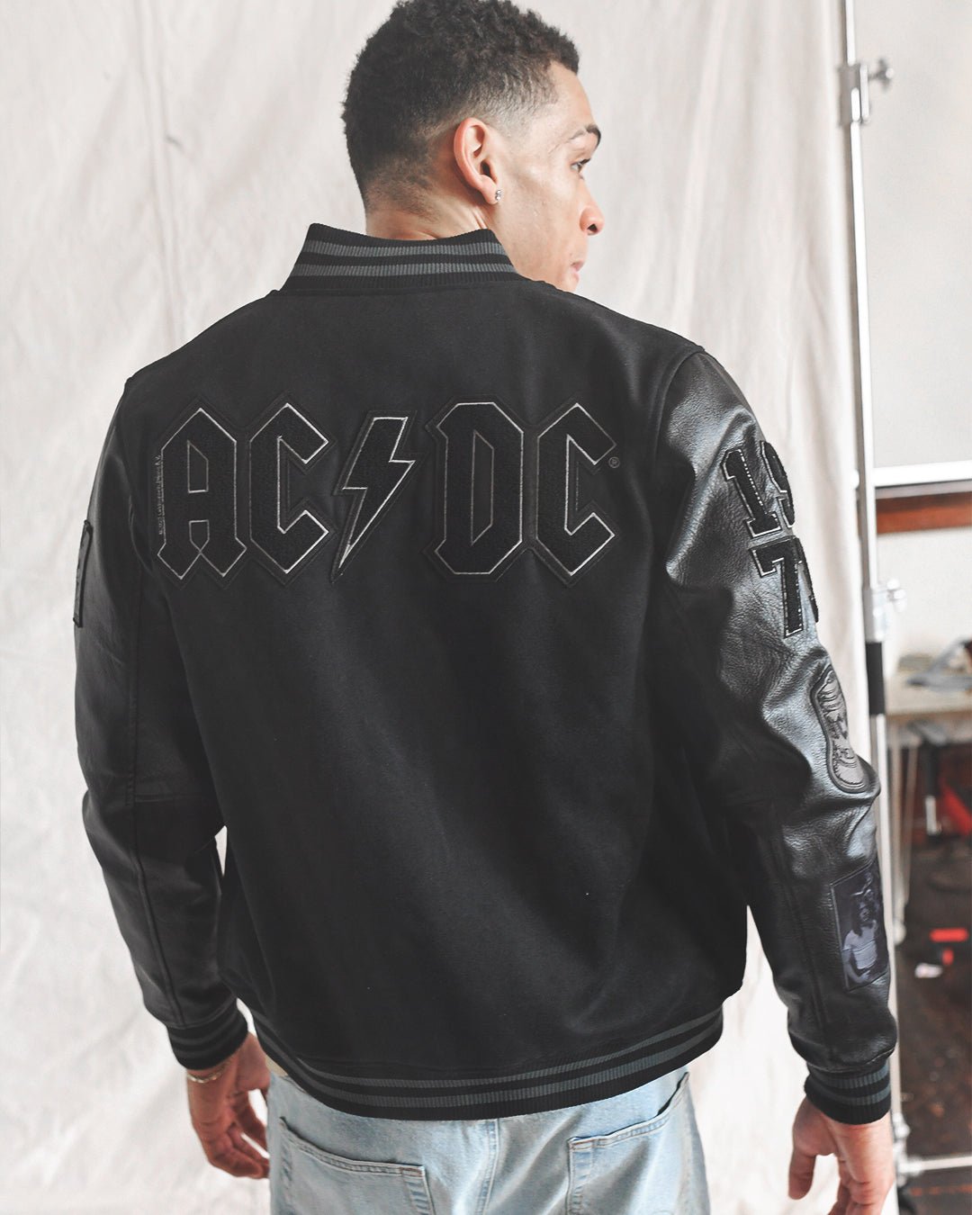 AC/DC Through The Eras Black Varsity Jacket - Roots of Fight