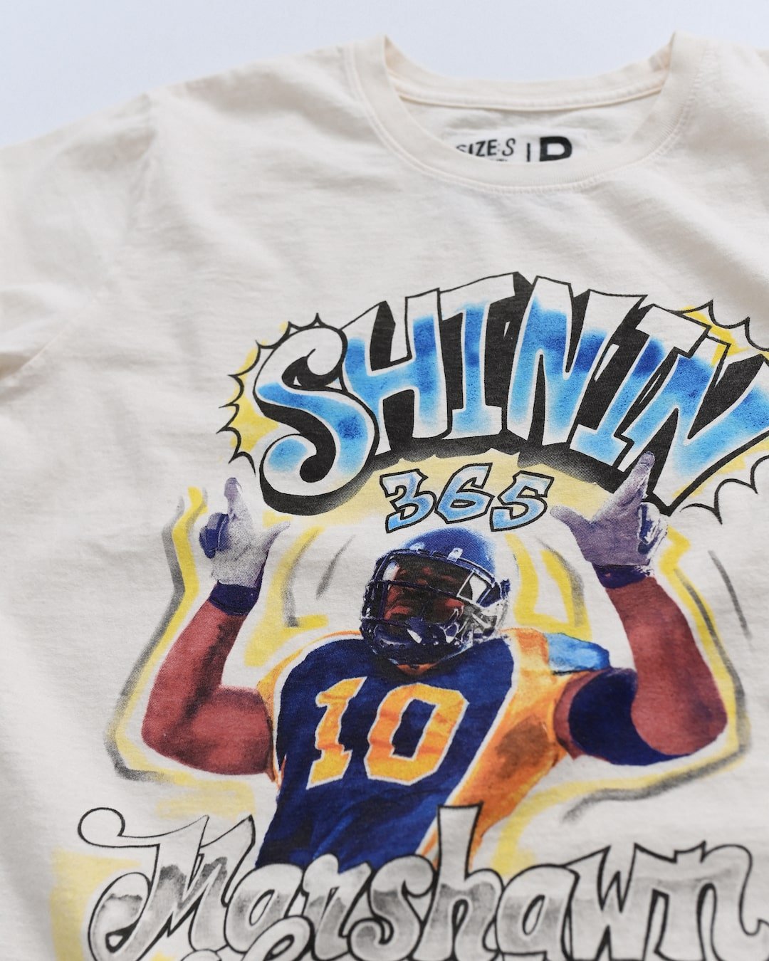 CAL - Marshawn Lynch Shinin&#39; 365 White Tee - Roots of Fight