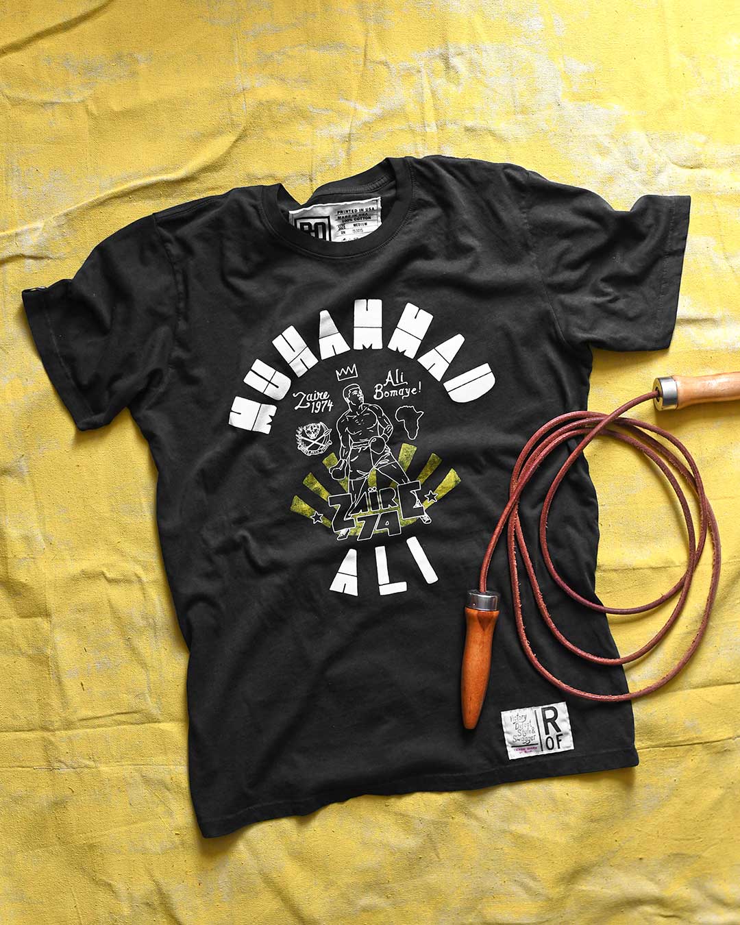 Ali Rumble Bomaye Black Tee - Roots of Fight