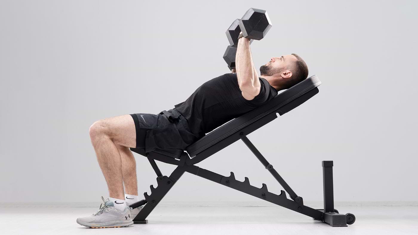 Training on adjustable weight bench with hexagon dumbbells