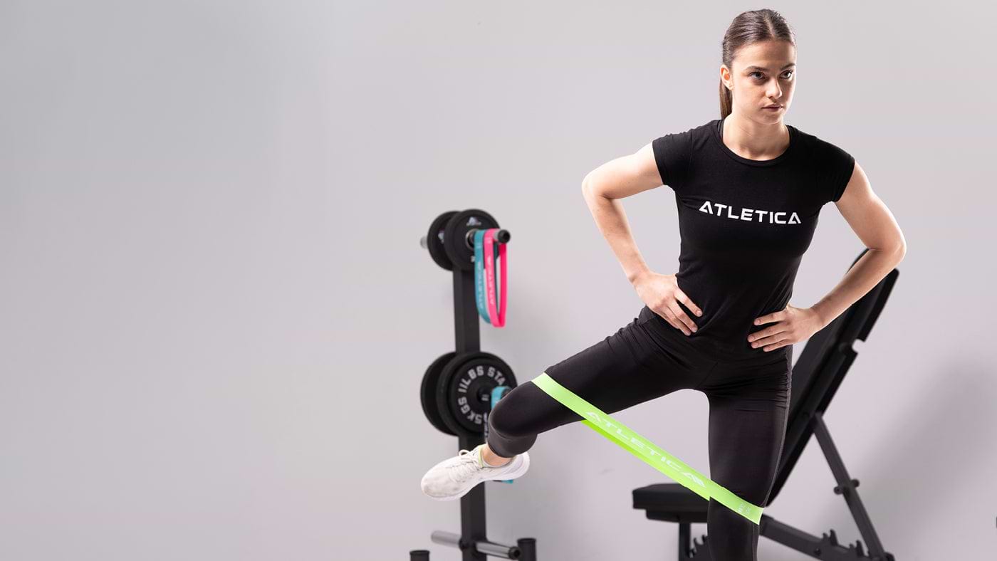 Leg raises with resistance band