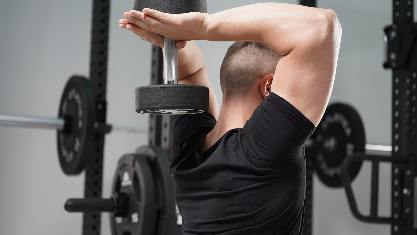 Back exercises with the round dumbbell