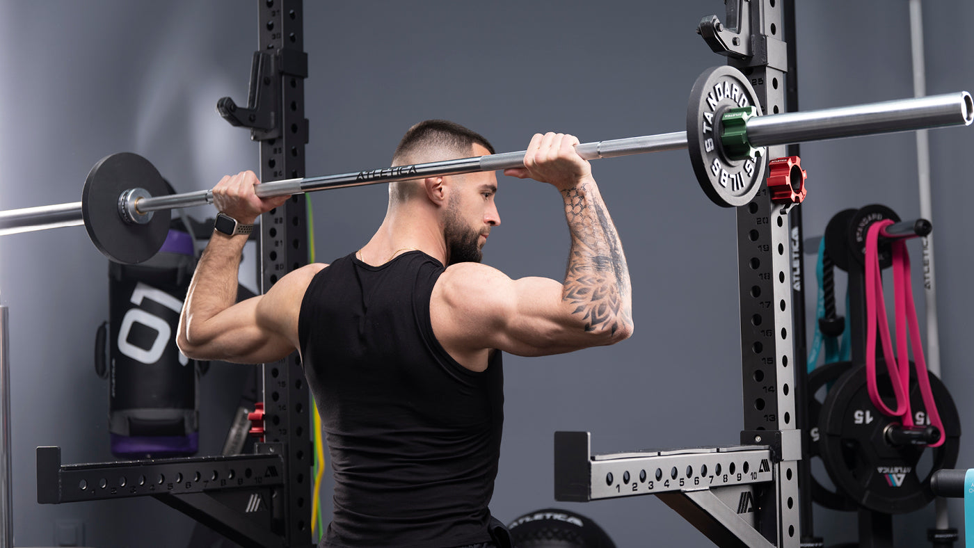 Back stretching with the barbell