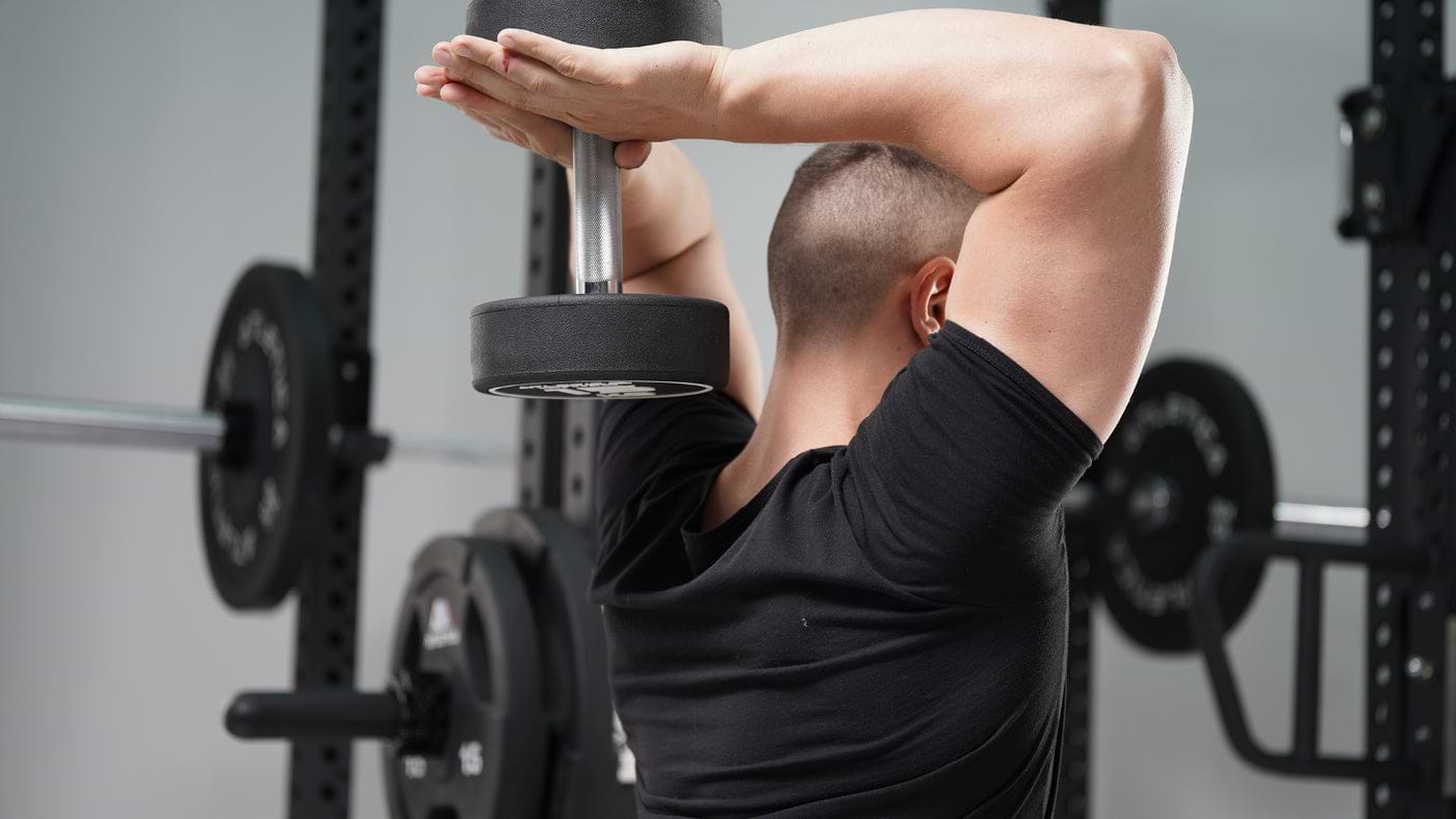 stretching with dumbbells