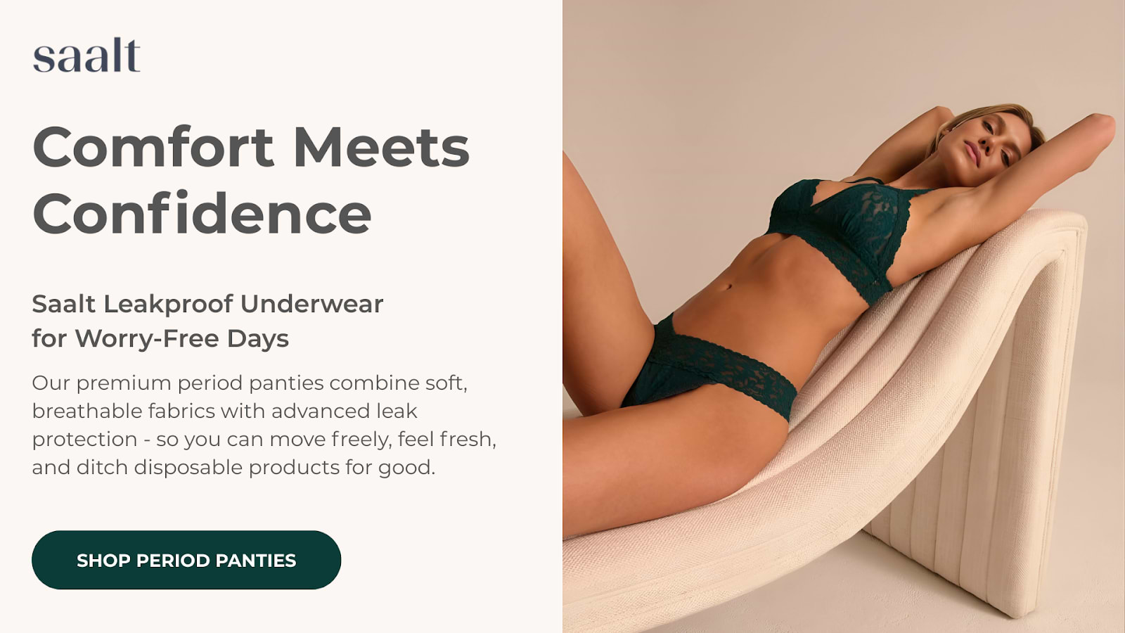 Saalt ad featuring a woman in dark green lace leakproof underwear reclining on a white curved chaise.