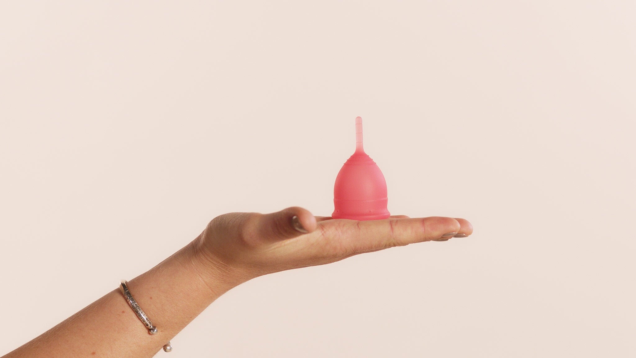 woman holding a saalt cup