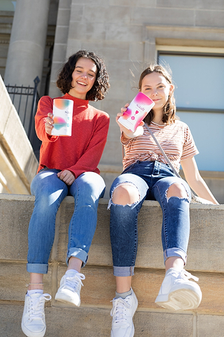 Teenage models holding Saalt Teen Cups