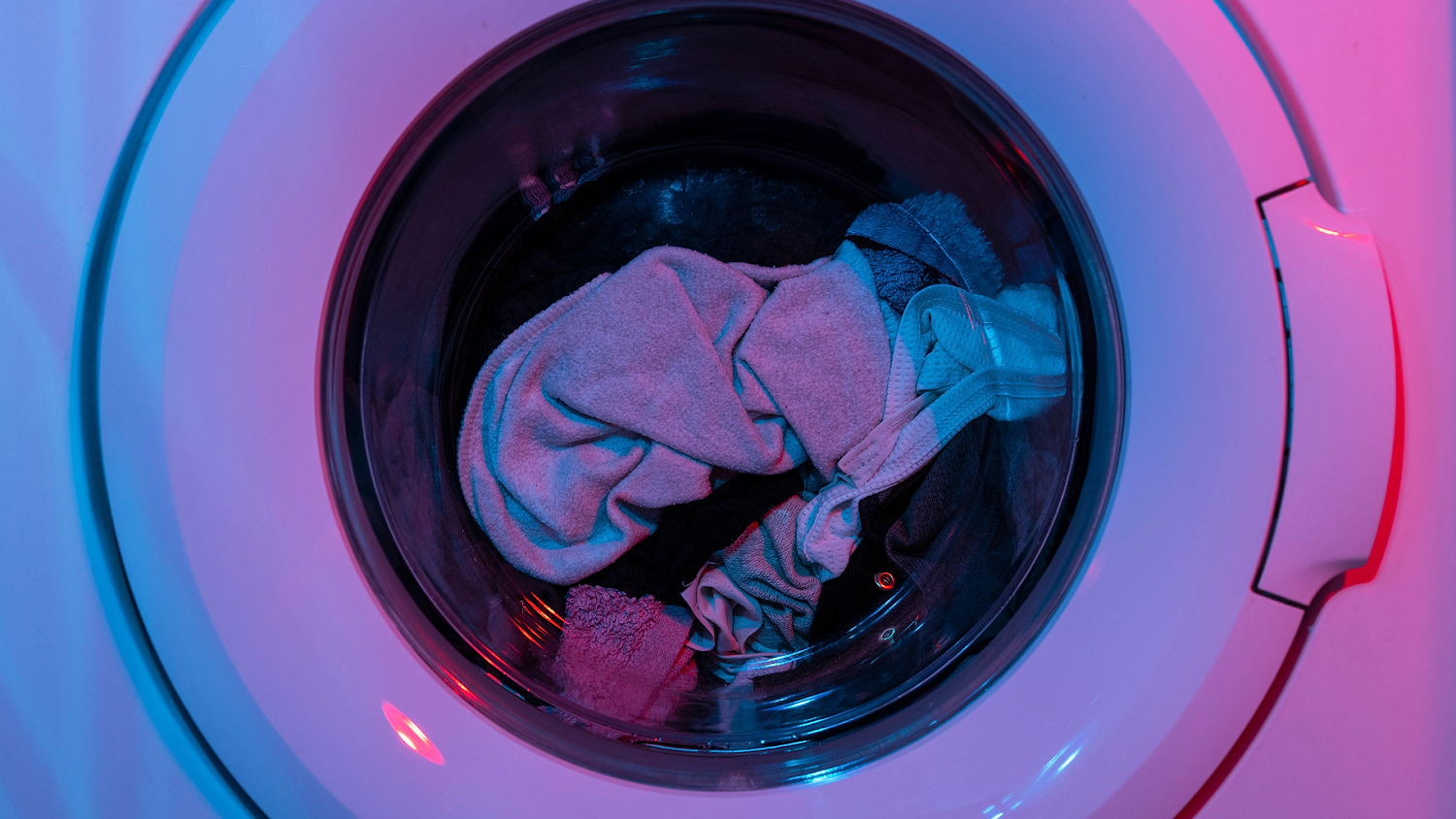 A Washing Machine Filled With Laundry