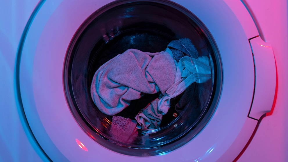 A Washing Machine Filled With Laundry