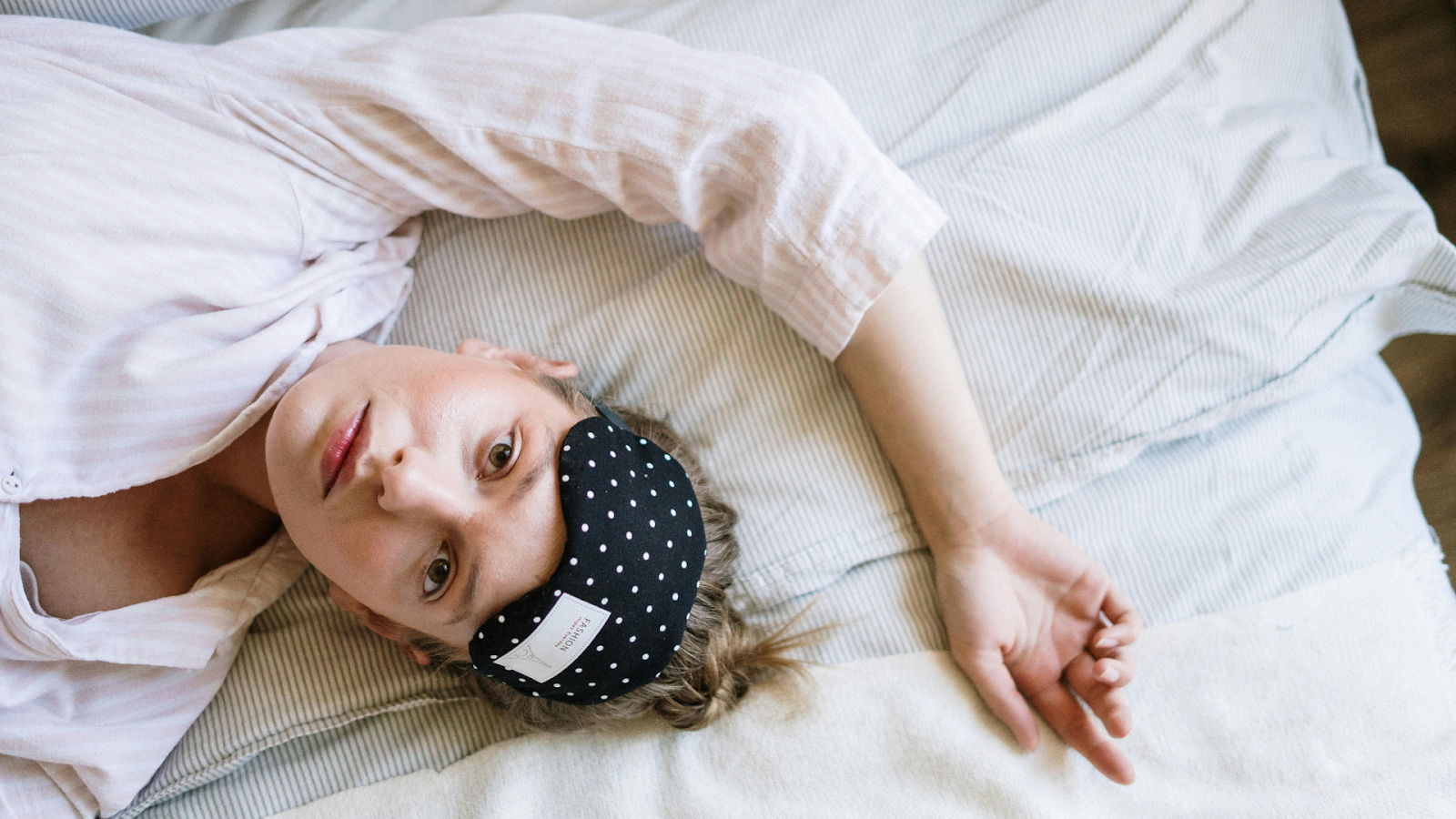 Woman Waking Up With Night Sweats During Period